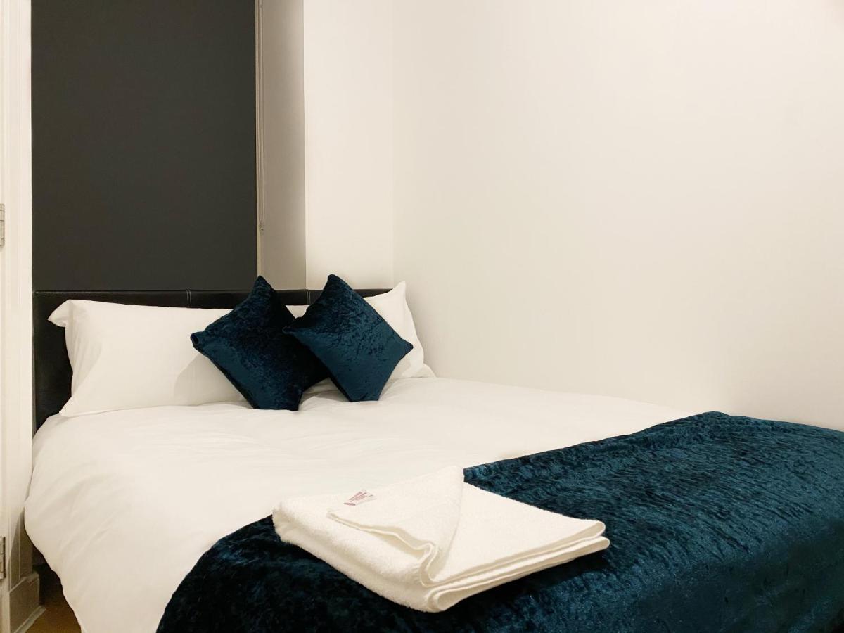Cozy Nights - Ibrox Street Apartment กลาสโกว์ ภายนอก รูปภาพ
